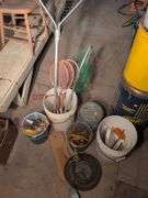 Large assortment of fishing supplies - nets, minnow traps, and more