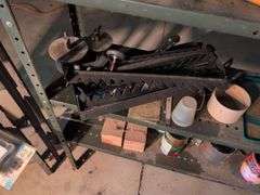 Metal shelving and wooden shelving - both with contents