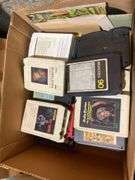 (2) boxes of 8 tracks and (2) boxes of records