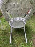 White Wicker Rocking Chair and Flower Basket