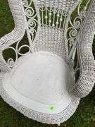 White Wicker Rocking Chair and Flower Basket