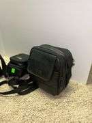 (2) Camcorders and (1) Camera