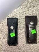 (2) Folding Knives w/ Leather Pouches