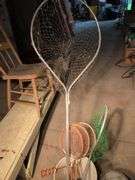 Large assortment of fishing supplies - nets, minnow traps, and more