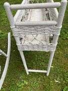 White Wicker Rocking Chair and Flower Basket