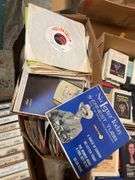 (2) boxes of 8 tracks and (2) boxes of records