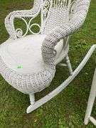 White Wicker Rocking Chair and Flower Basket