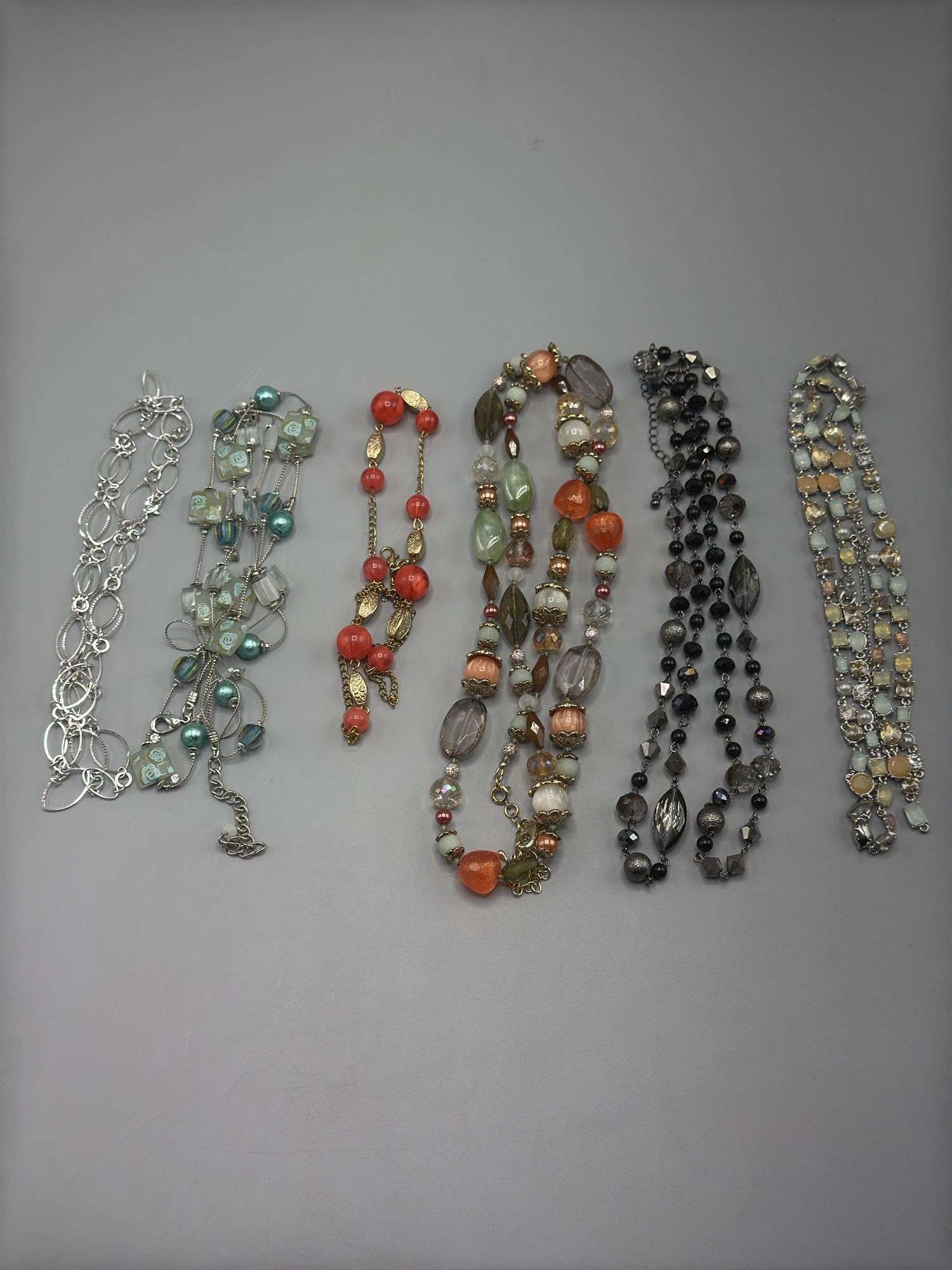 VARIETY OF BEADED NECKLACES