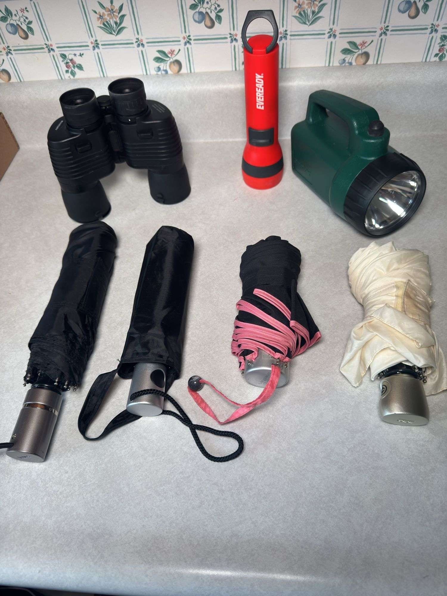 UMBRELLAS, FLASHLIGHTS, BINOCULARS