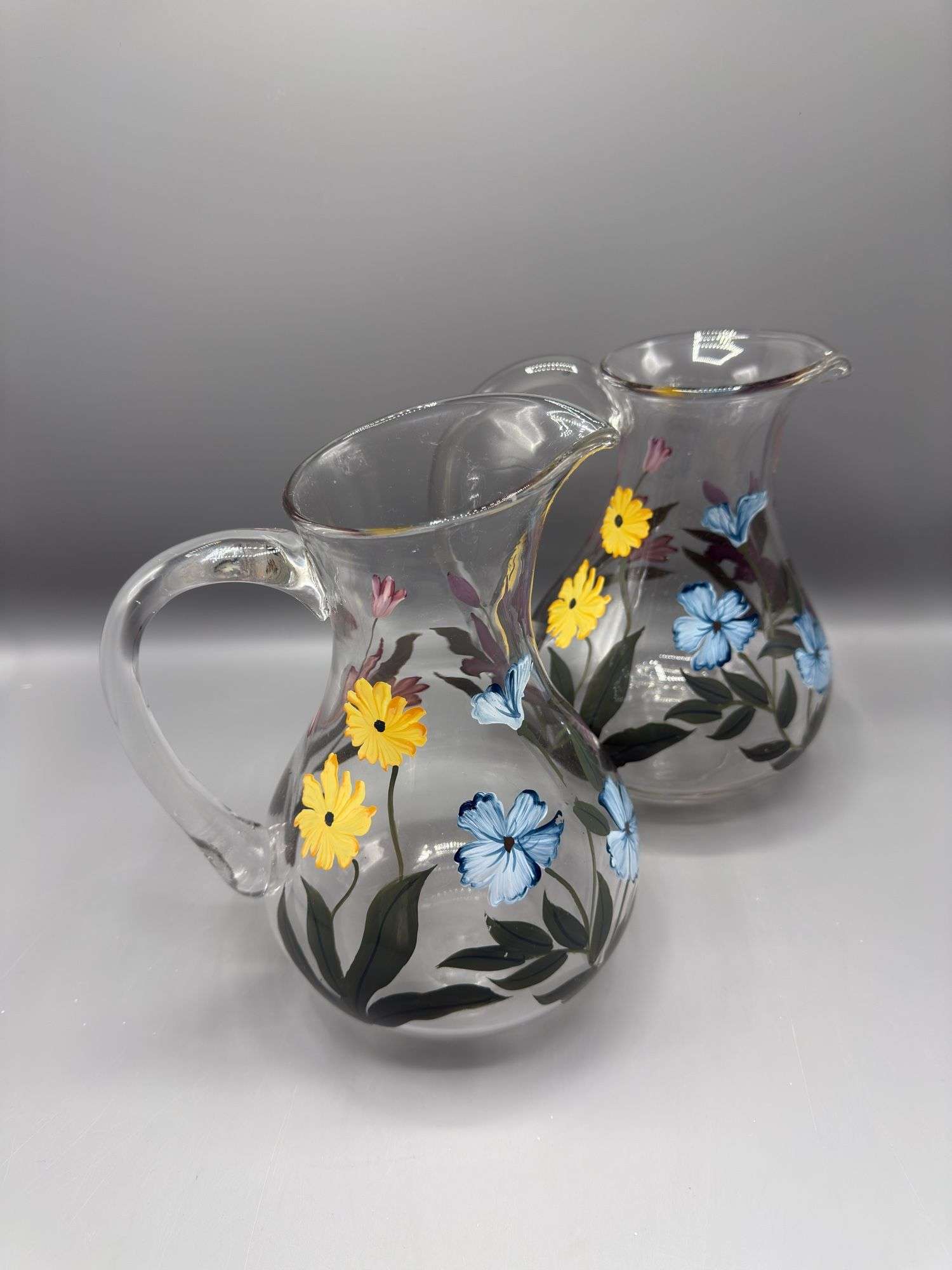 PAIR OF ONEIDA HAND PAINTED PITCHERS