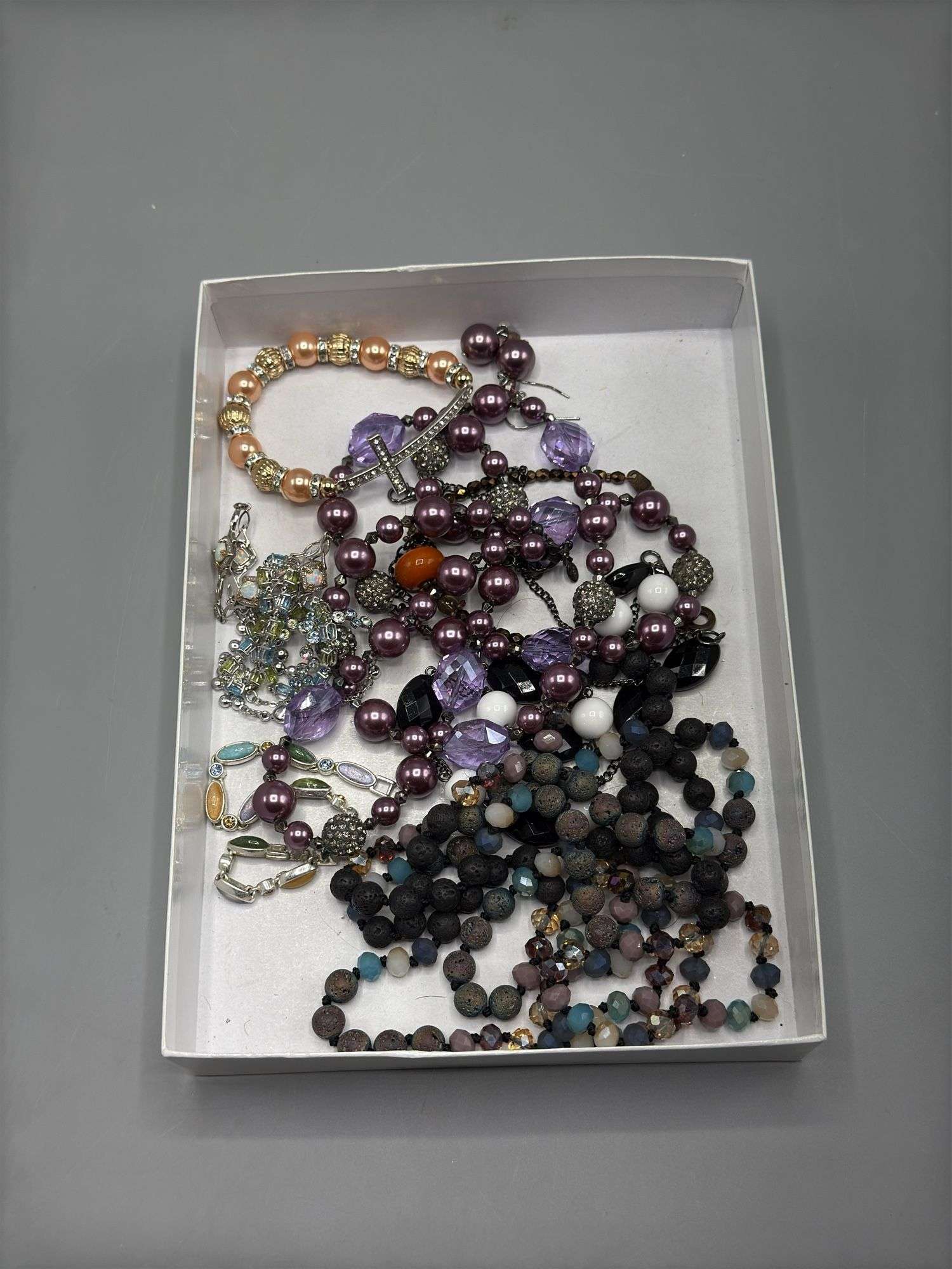 VARIETY OF BEADED NECKLACES EARRINGS AND BRACELETS