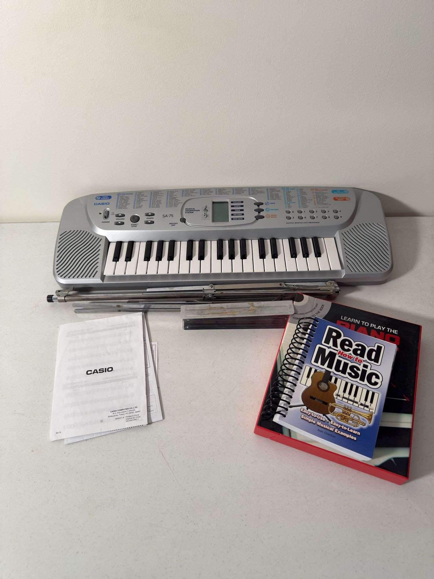 CASIO SA-75 KEYBORAD WITH MANUAL, TELESCOPIC MUSIC STAND, LEARN TO PLAY THE PIANO AND KEYBOARD, HOW 