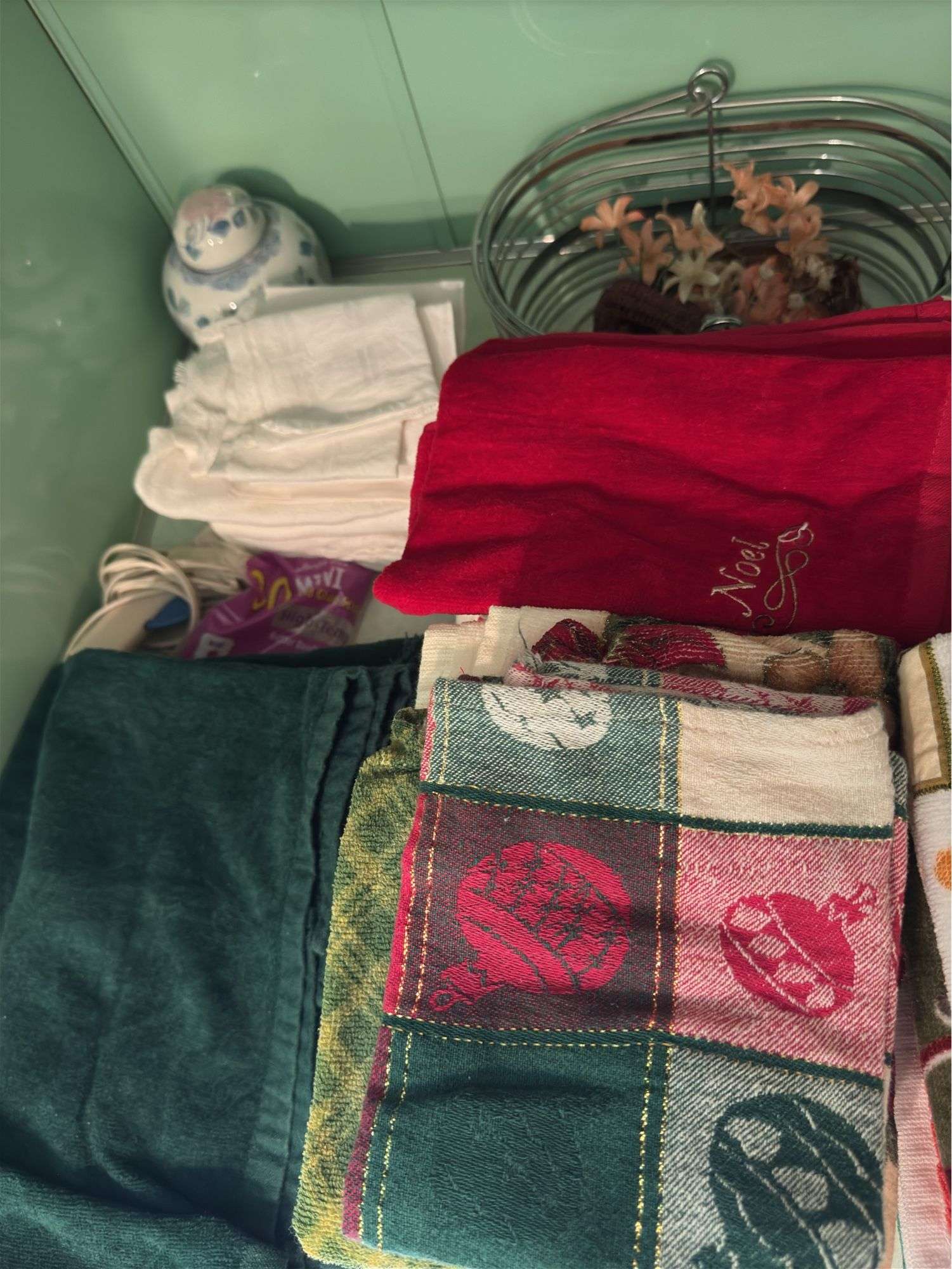 CONTENTS OF COUNTER TOP, TEA TOWELS (SOME NEW), CANDLES,