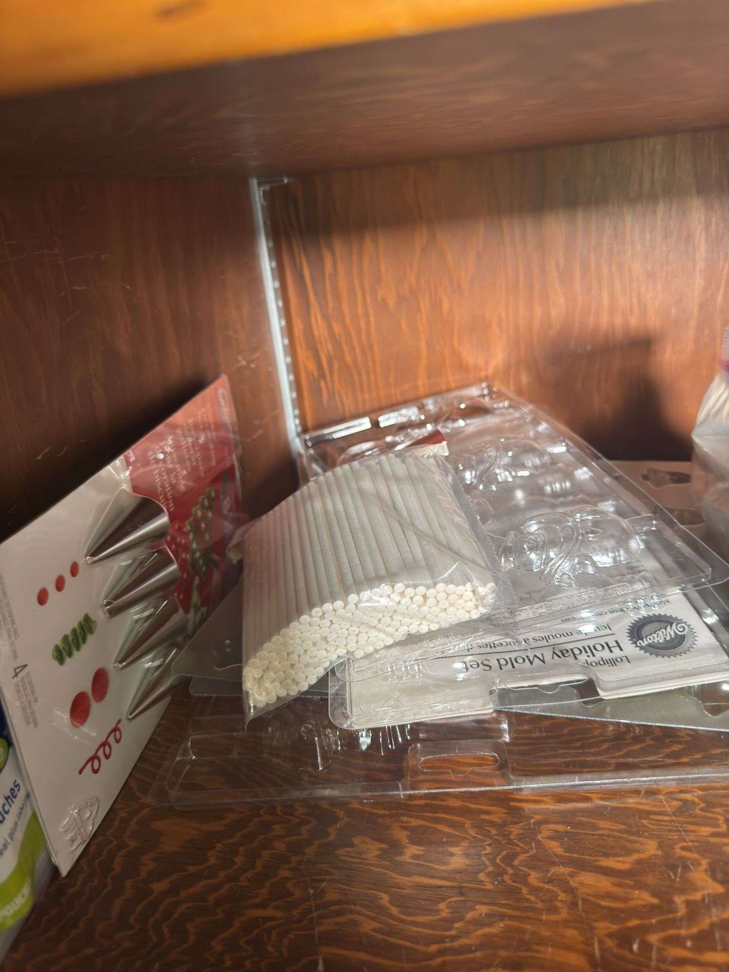 FOOD DECORATING TIPS AND MOLDS, UNOPENED TEA BOXES, MATCHES, CUPCAKE LINERS, PARCHMENT PAPERS