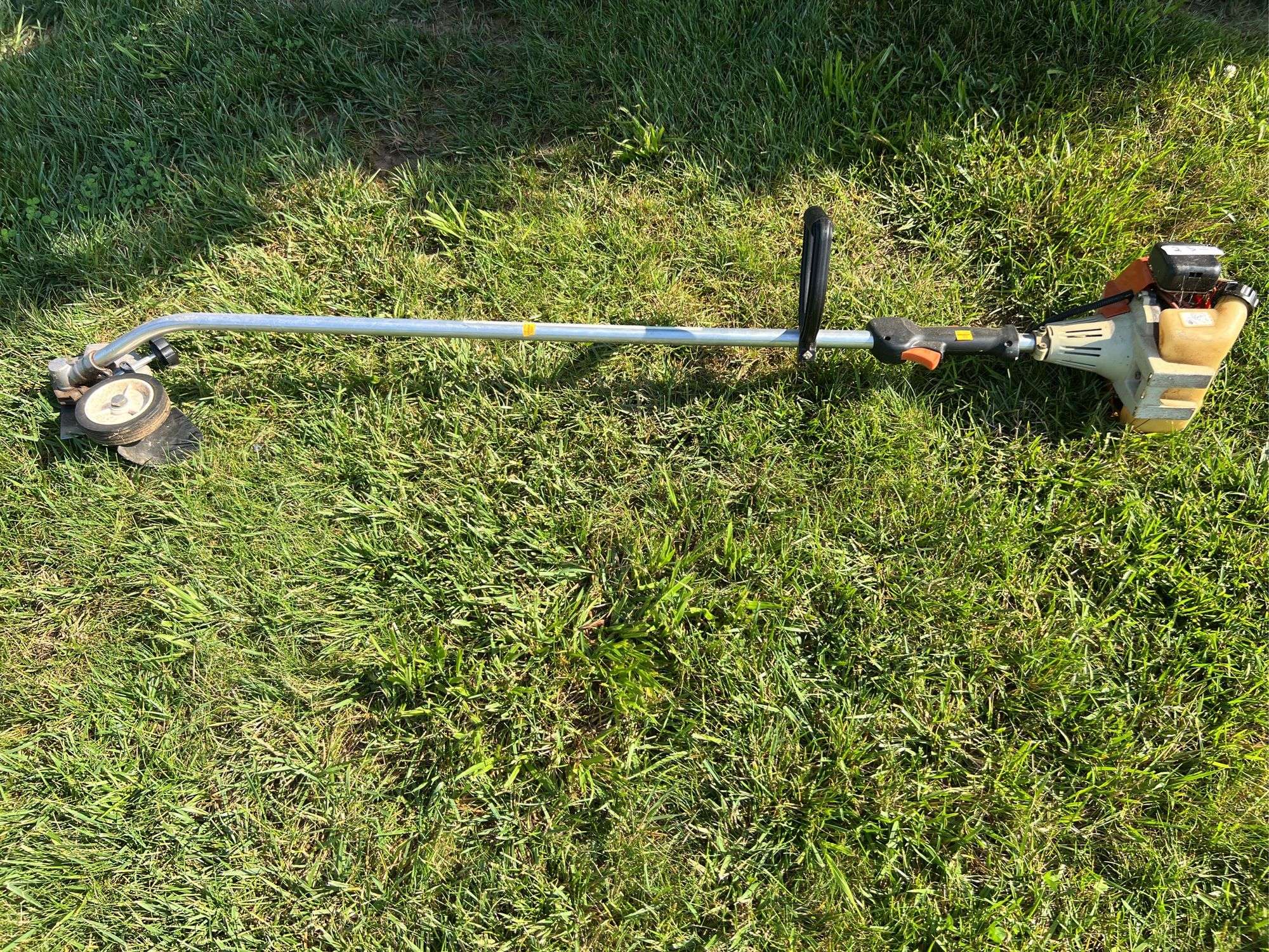 Stihl FC 75 Weedeater with Lawn Edger Attachment