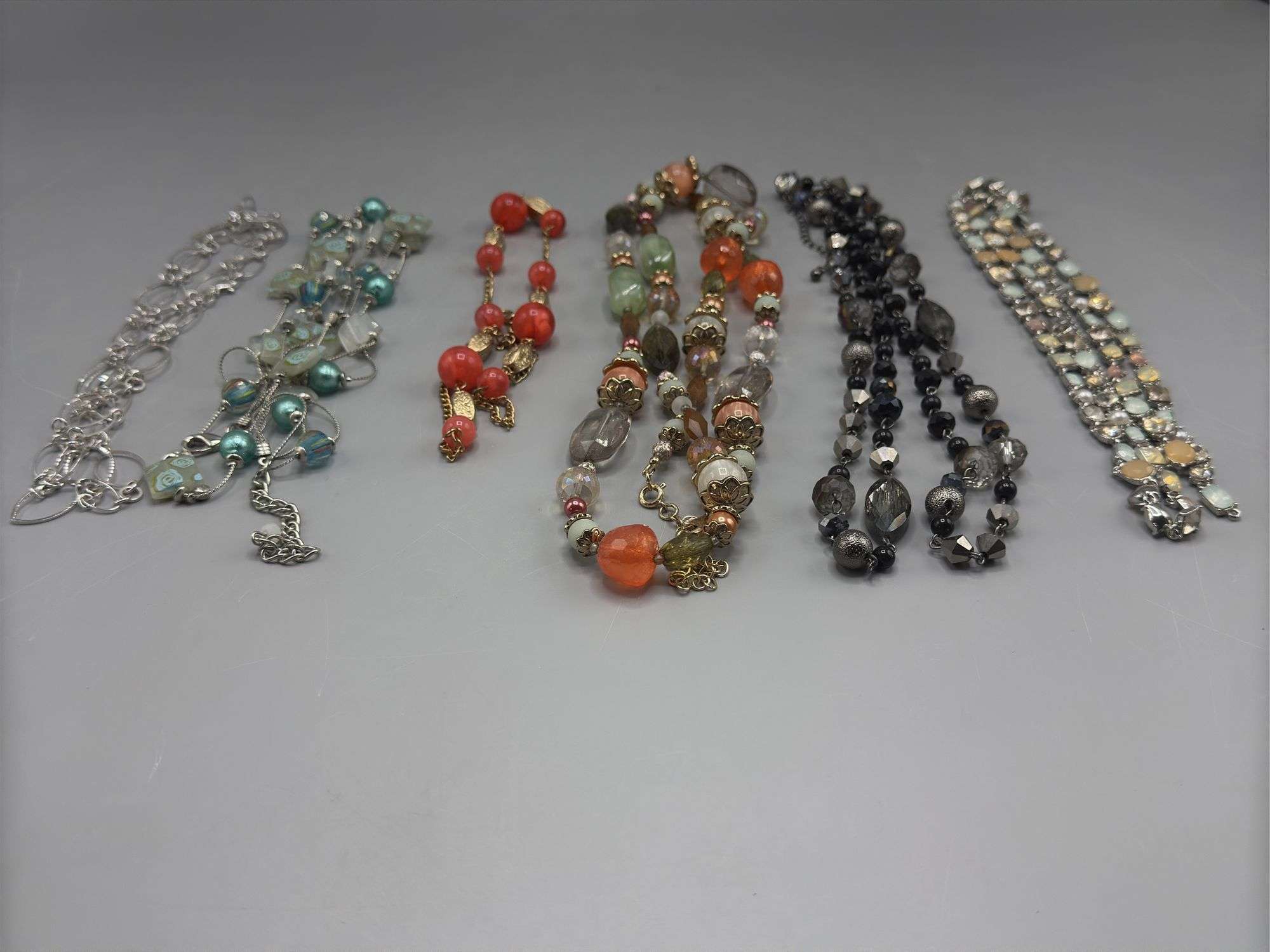 VARIETY OF BEADED NECKLACES