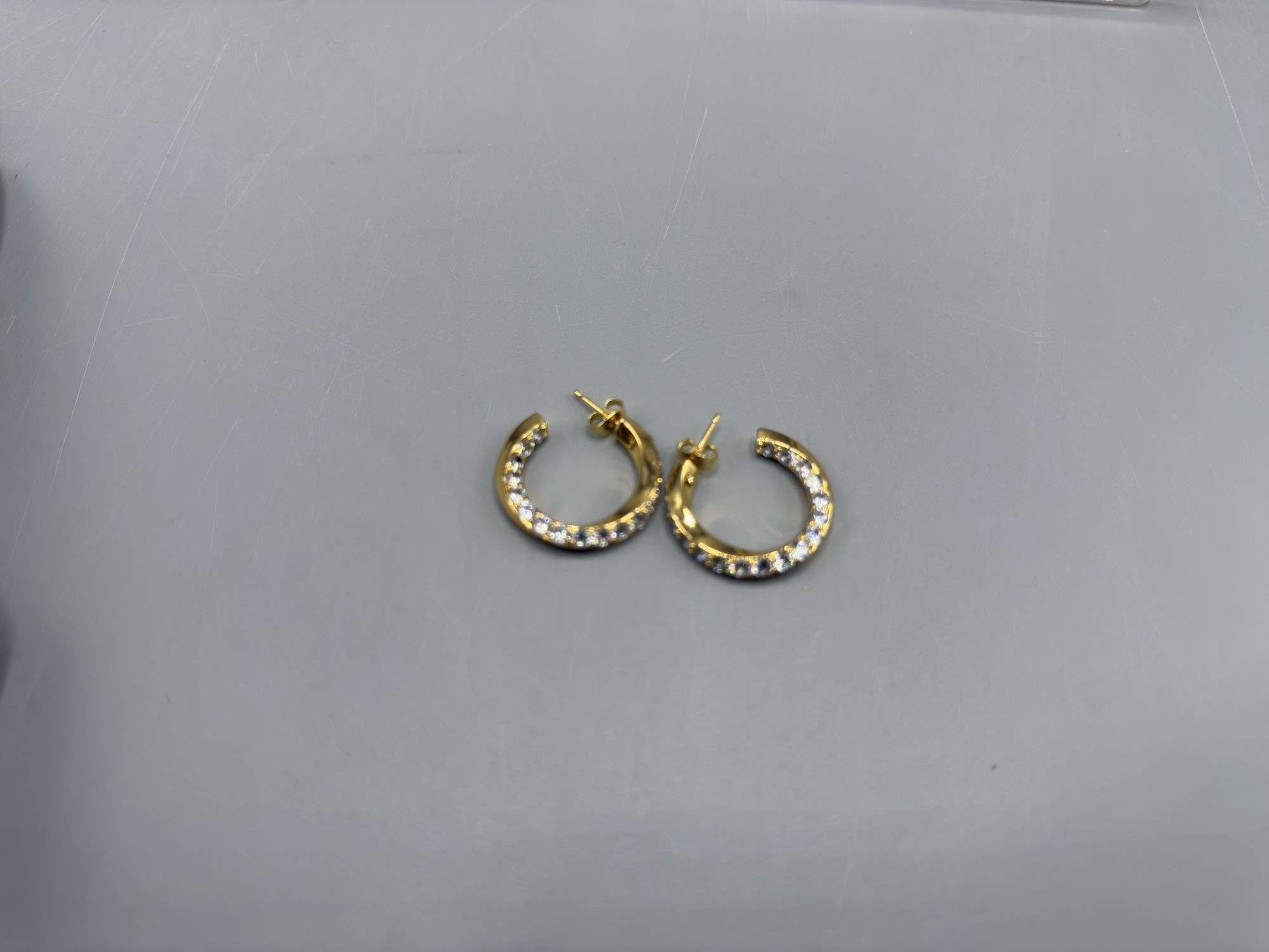 VARIETY OF EARRINGS, NECKLACES, AND PENDANTS