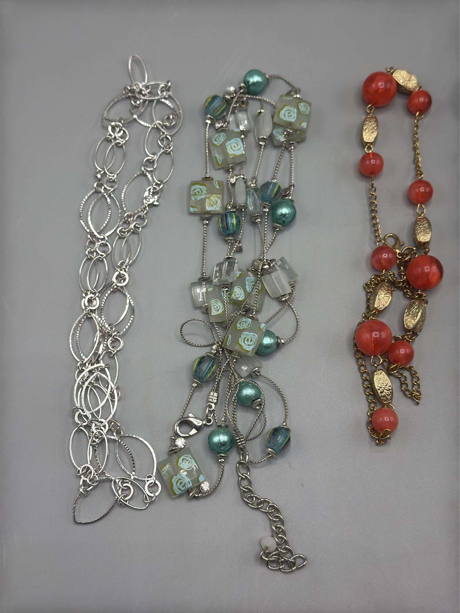 VARIETY OF BEADED NECKLACES