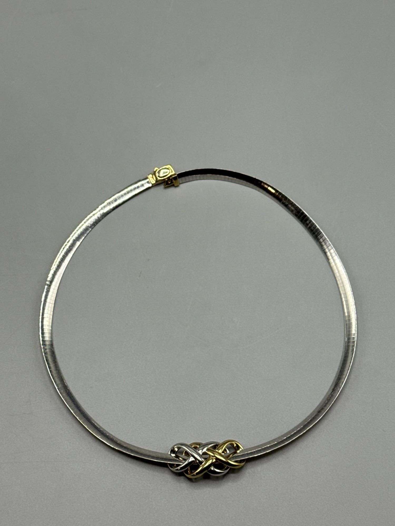 LOVE KNOT GOLD AND SILVER REVERSIBLE 14K ITALY NECKLACE