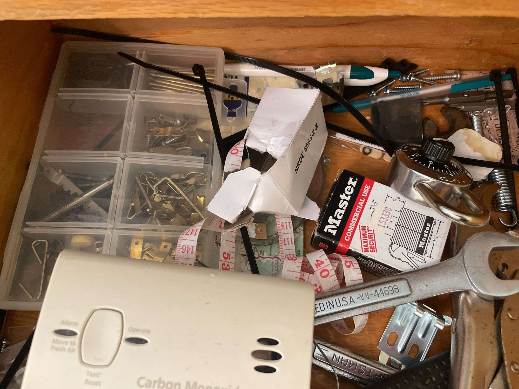 Contents of 2 drawers - tools, tape, batteries, and more