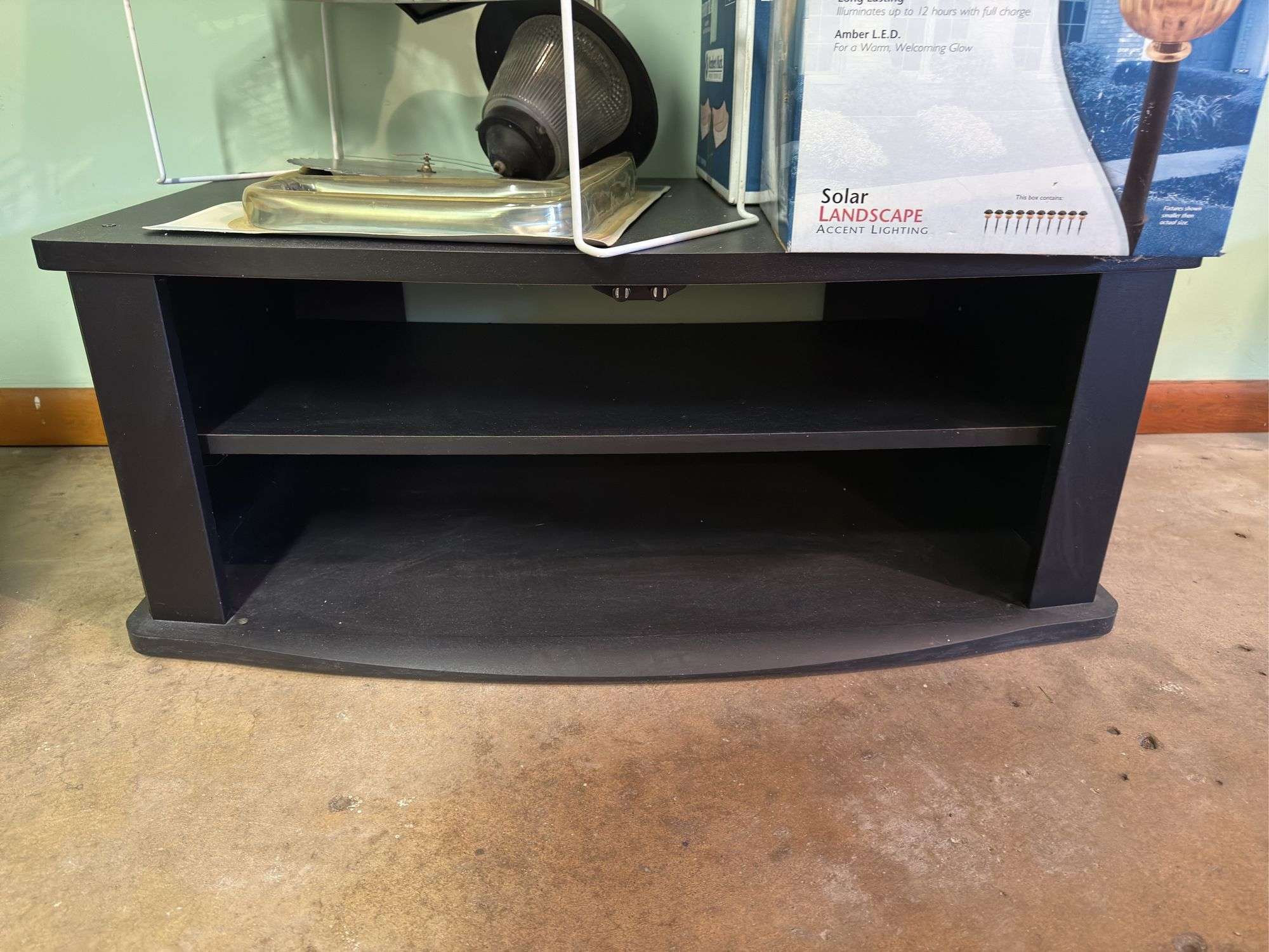 TV STAND/CONSOLE WITH ALL CONTENTS PICTURED, INCLUDING OSU GARDEN FLAG,  OX OF SOLAR LIGHTS, GARDEN 