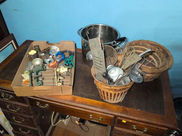 Antique kitchen items - grinder, cookie cutters, pot, cheese grader, and more