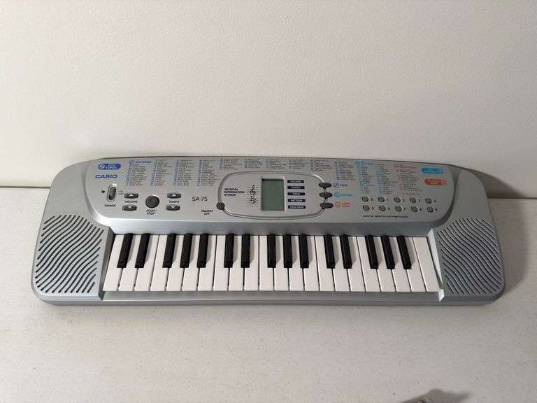 CASIO SA-75 KEYBORAD WITH MANUAL, TELESCOPIC MUSIC STAND, LEARN TO PLAY THE PIANO AND KEYBOARD, HOW