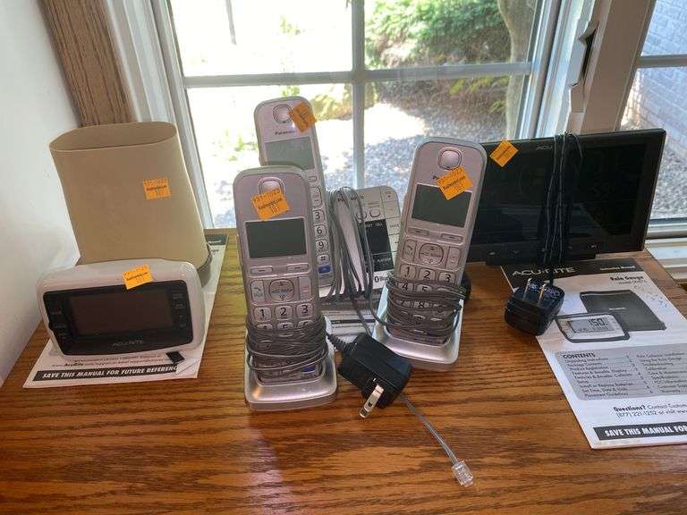 Assortment of Landline Phones and Monitors