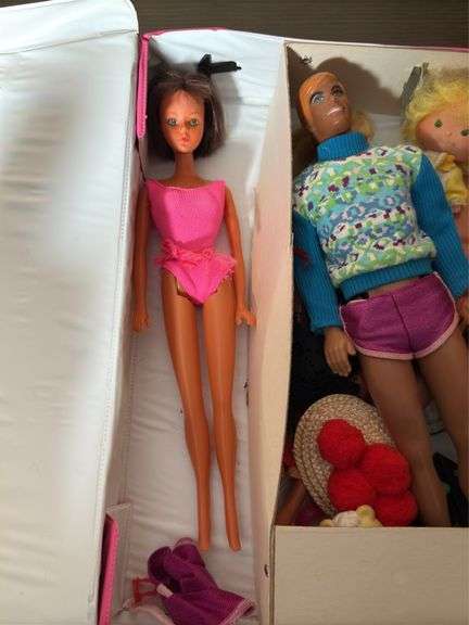 VINTAGE “THE WORLD OF BARBIE” DOLL CASE AND FASHION DOLL CASE WITH DOLLS AND CLOTHES