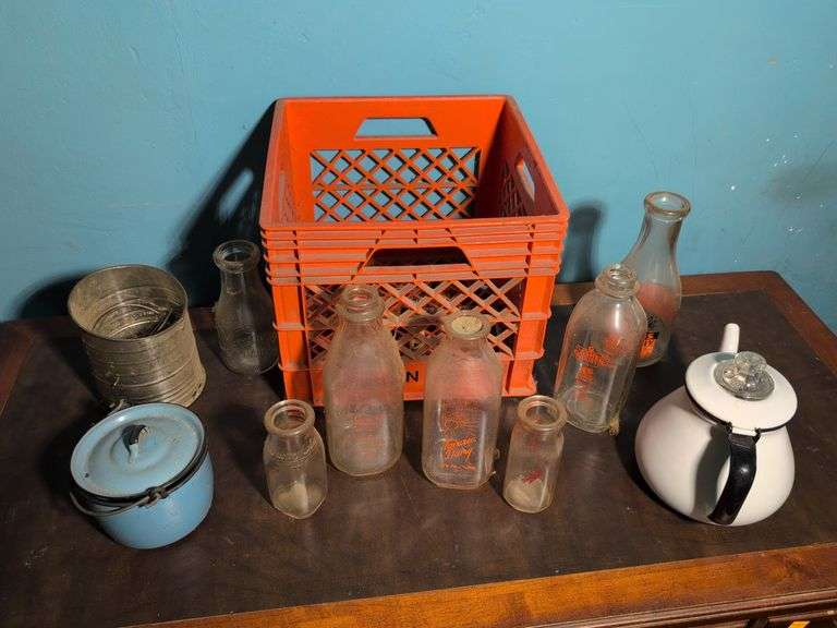Goshen Dairy milk crate, milk bottles, and other antiques