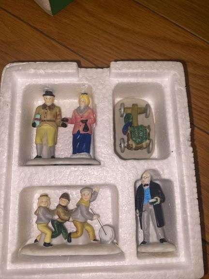 Department 56/Heritage Village “Holiday Travelers” and “A Christmas Beginning”