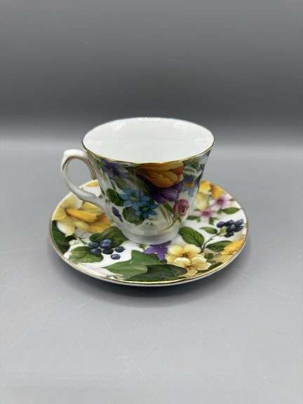 BAUM BROS 4 PC TEACUP AND SAUCER SET