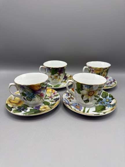 BAUM BROS 4 PC TEACUP AND SAUCER SET