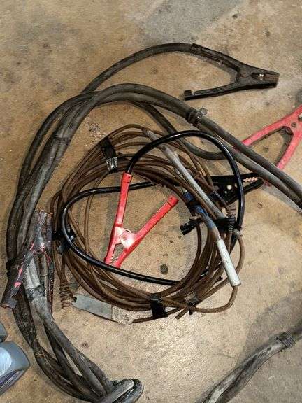 PAIR OF JUMPER CABLES, MOTOR OIL, AND GM SIDE MIRROR (SEE SERIAL CODE)