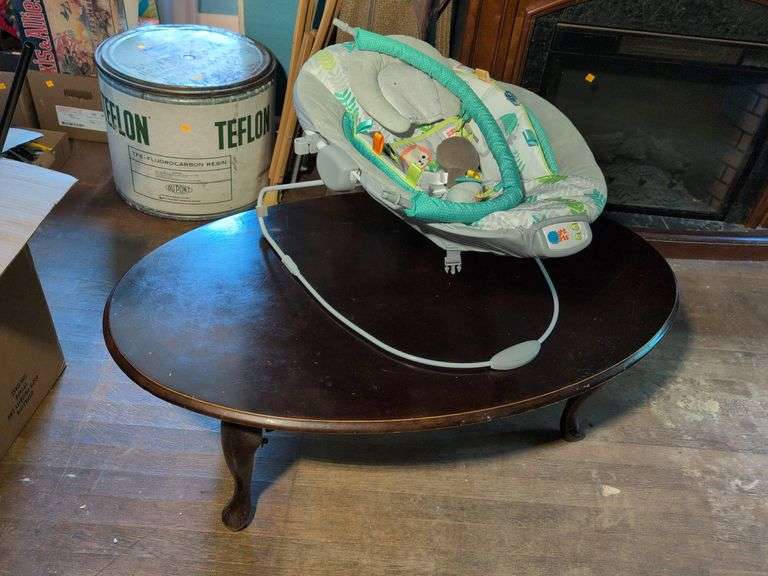 Wooden coffee table and Bright Starts baby bouncer