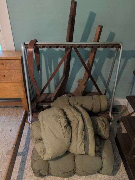 (3) Sleeping bags and gun rack