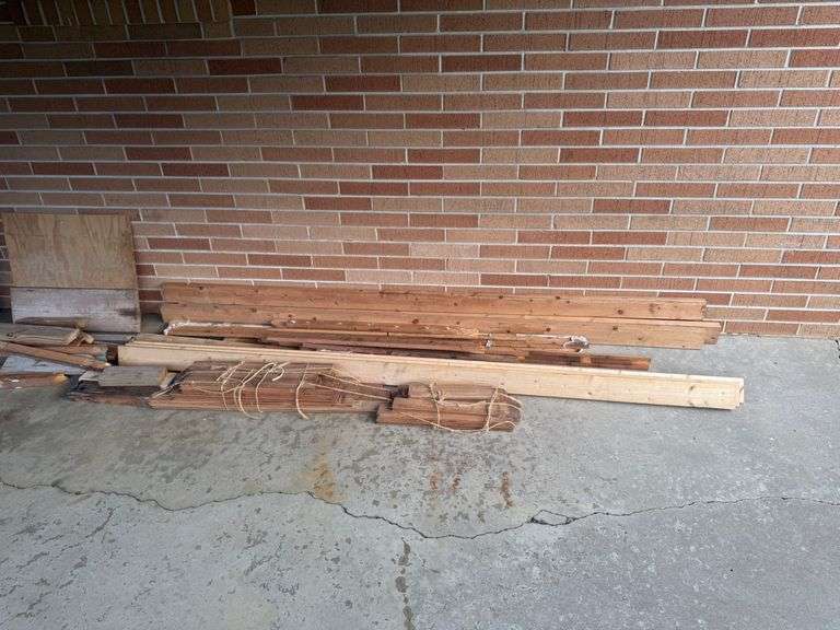 STACK OF MISC. LUMBER WITH 2x4’s , 1x4’s, AND MORE