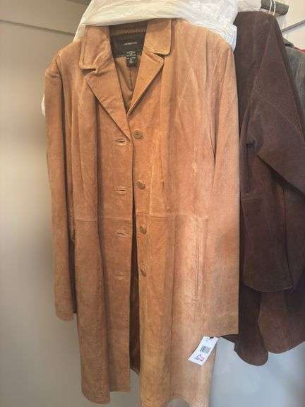 CONTENTS OF CLOSET WOMEN’S COATS AND JACKETS (SOME NEW WITH TAGS) ALOT OF SIZE L AND XL. SHOES SIZE