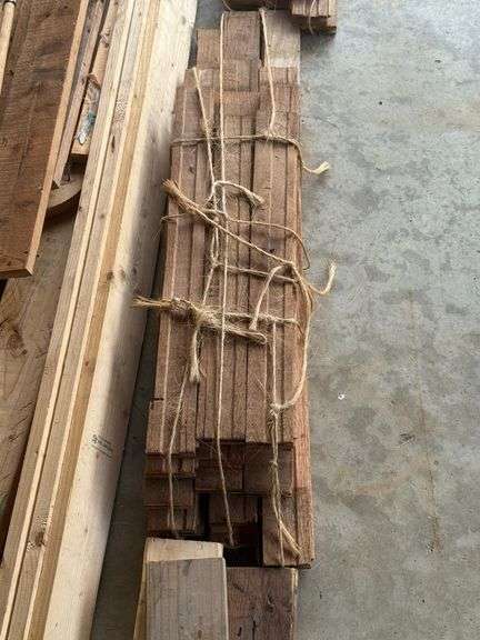 STACK OF MISC. LUMBER WITH 2x4’s , 1x4’s, AND MORE