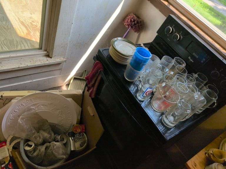 Glass mugs, plates, jar lids, and more