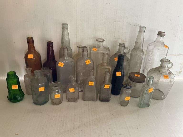 Assortment of Vintage Bottles and Jars