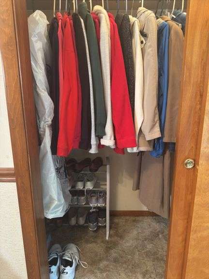 CONTENTS OF CLOSET WOMEN’S COATS AND JACKETS (SOME NEW WITH TAGS) ALOT OF SIZE L AND XL. SHOES SIZE