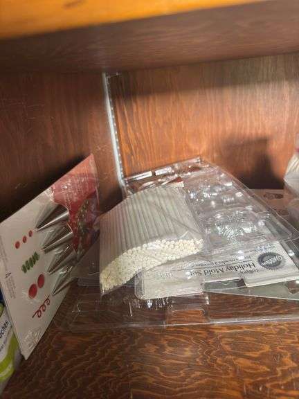 FOOD DECORATING TIPS AND MOLDS, UNOPENED TEA BOXES, MATCHES, CUPCAKE LINERS, PARCHMENT PAPERS