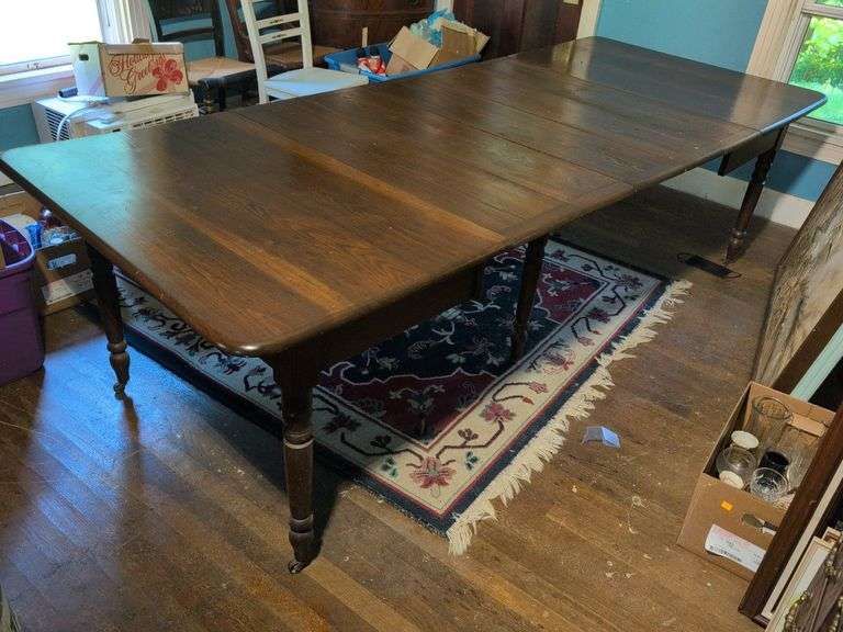 Zoar Walnut Six Legged antique dining table on wheels with (5) leaves