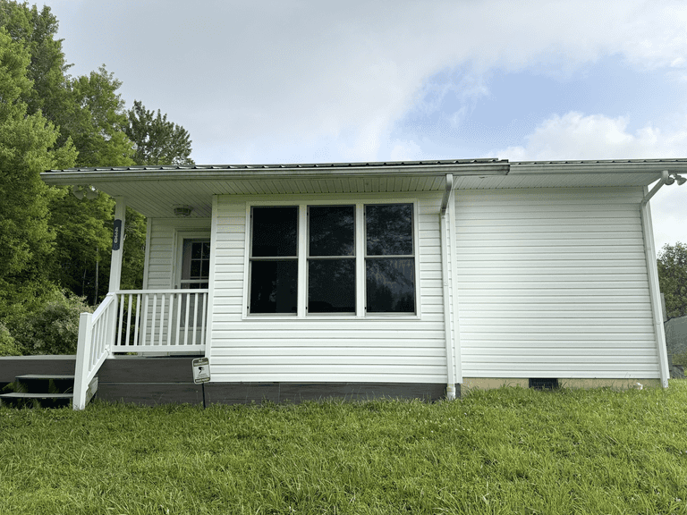 41.97 +/- acres surface with 79.85 +/- acres oil and gas rights, modern farmhouse