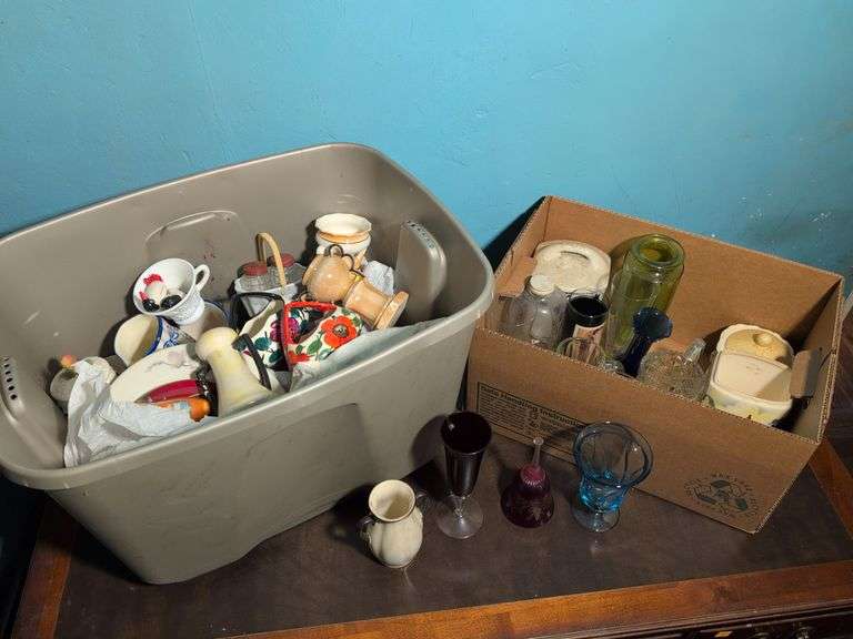 Assortment of glassware and other decorative pieces - vases, pitchers, and more knick knacks