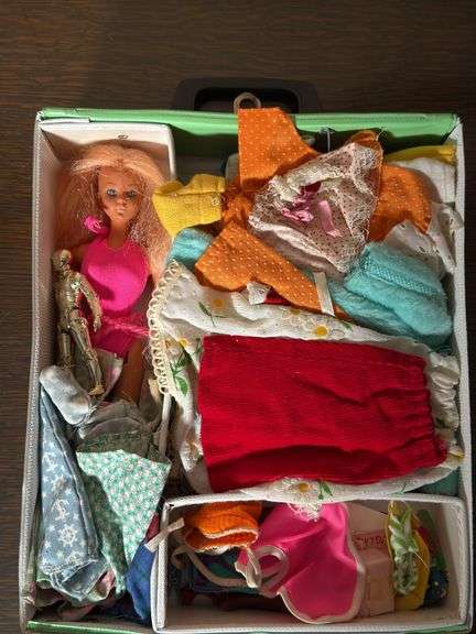 VINTAGE “THE WORLD OF BARBIE” DOLL CASE AND FASHION DOLL CASE WITH DOLLS AND CLOTHES