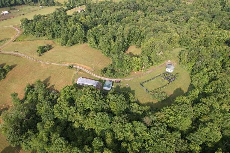 41.97 +/- acres surface with 79.85 +/- acres oil and gas rights, modern farmhouse