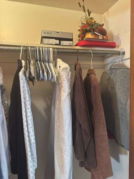 CONTENTS OF CLOSET WOMEN’S COATS AND JACKETS (SOME NEW WITH TAGS) ALOT OF SIZE L AND XL. SHOES SIZE