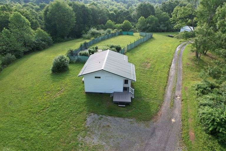 41.97 +/- acres surface with 79.85 +/- acres oil and gas rights, modern farmhouse